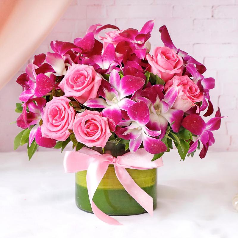 Bouquet de fleurs Purple Orchids & Pink Roses In Round Vase