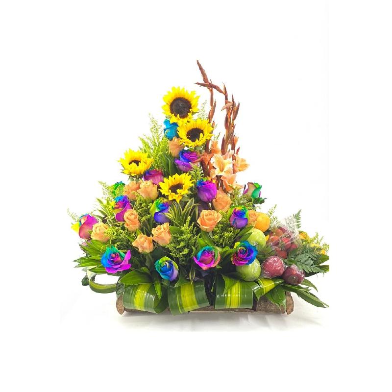 Bouquet de fleurs Rainbow arrangement with sunflowers and fruit Bouquet de fleurs Rainbow arrangement with sunflowers and fruit